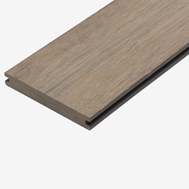 Composite deck installation highlighting premium surface textures and proper joist spacing